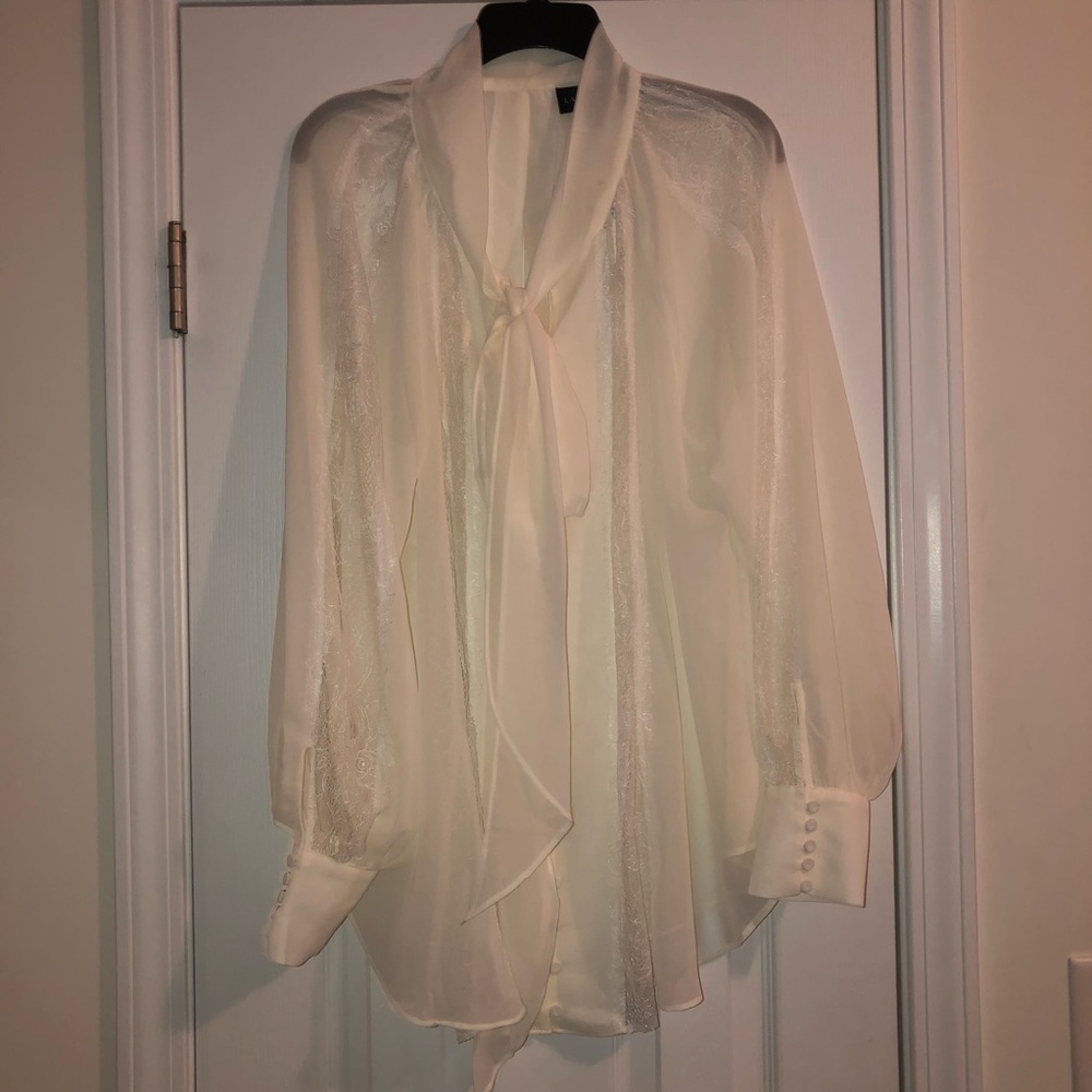 Beautiful sheer and lace off white/ cream top!